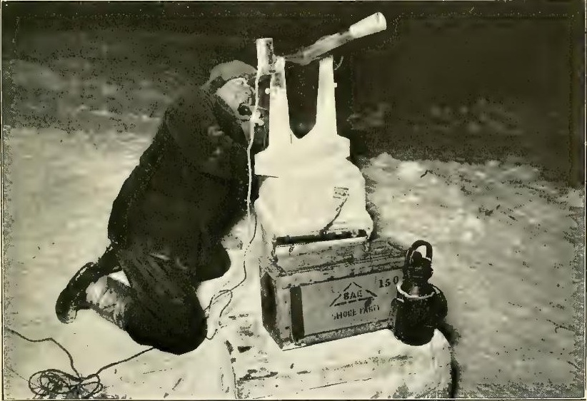 Charles Wright working at night with his transit. August 8th 1911